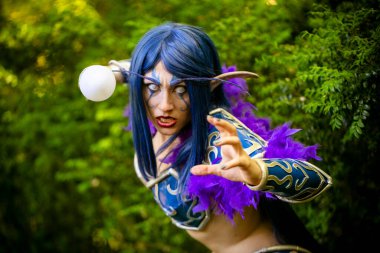 Lucca, Italy - 2018 10 31 : Lucca Comics free cosplay event around city warcraft Night Elf Girl . High quality photo