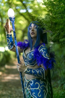 Lucca, Italy - 2018 10 31 : Lucca Comics free cosplay event around city warcraft Night Elf Girl . High quality photo