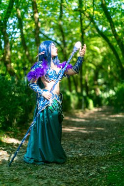 Lucca, Italy - 2018 10 31 : Lucca Comics free cosplay event around city warcraft Night Elf Girl . High quality photo