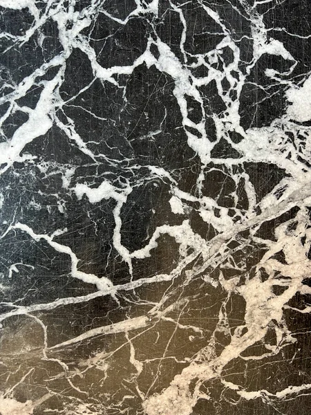 black marble background with white veins. High quality photo