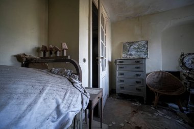 bedroom with dust in abandoned house. High quality photo