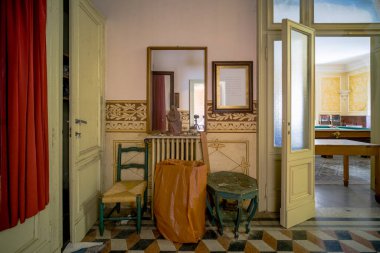 fireplace and mirror room in large abandoned house. High quality photo