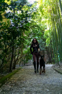 Lucca, Italy - 2018 10 31 : Lucca Comics free cosplay event around city steampunk girl with dog. High quality photo