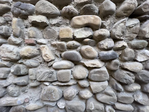 medieval castle walls with pebbles and stones. High quality photo