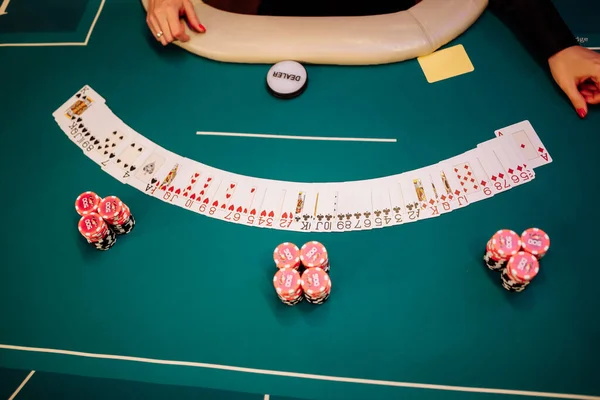Player chips and the start of poker hands. — Stock Photo, Image