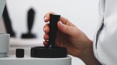 Joystick for medical equipment. The doctor examines the patient.