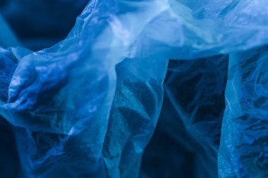 Blue polyethylene. Heterogeneous texture of polyethylene. Close-up. High quality photo