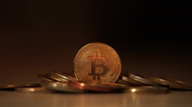 Metal gold coins of cryptocurrency. Bitcoin. High quality 4k footage