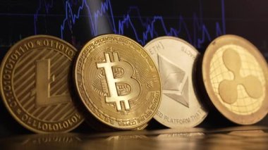 Cryptocurrency chart on the screen. Coins Litecoin, Bitcoin, Ethereum, Ripple. High quality 4k footage