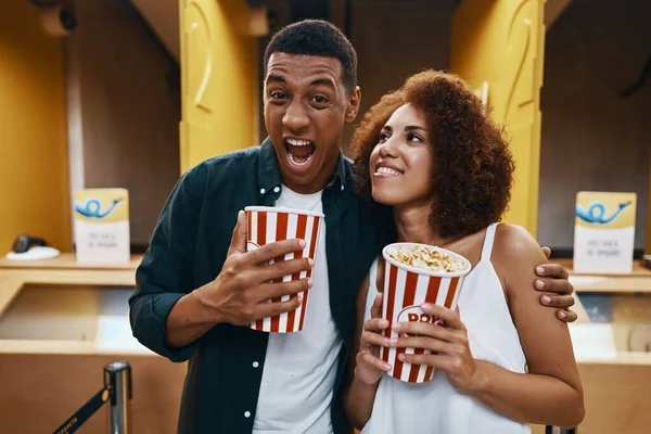 A man and a woman went to the cinema. High quality photo