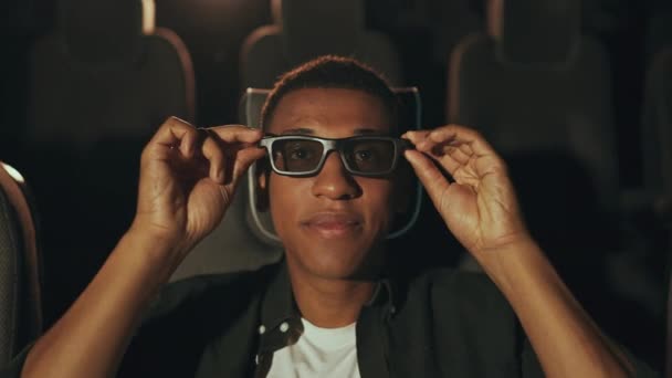 Man Puts Glasses Cinema High Quality Footage — Video