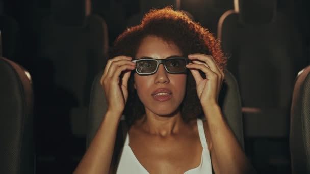 Young Woman Puts Glasses Watch Movie High Quality Footage — Vídeo de Stock