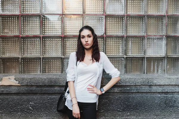 Female portrait in a neon city. High quality photo