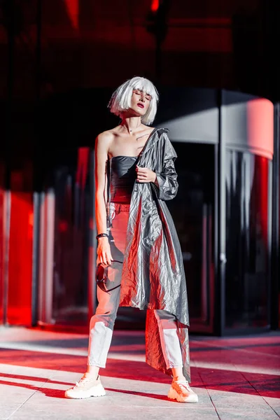 Futuristic style. Cyberpunk woman. High quality photo