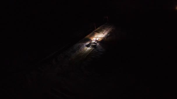 Night work of snowcat at ski resort at night time — Stock Video