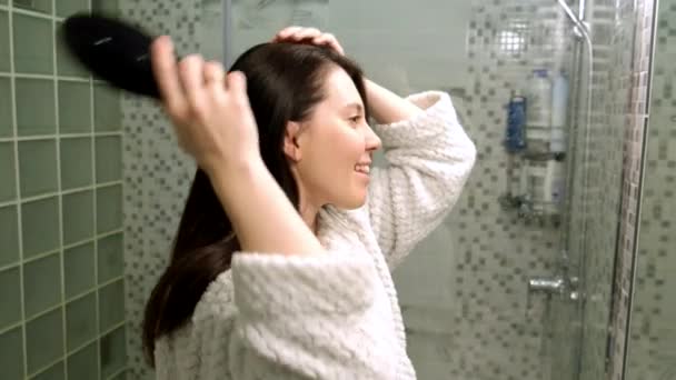 Woman Brushing Her Hair Bathroom Front Mirror Beauty Care — Vídeos de Stock