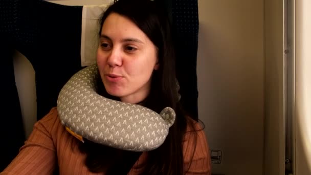 Woman traveler on the train talking on camera — Stock video