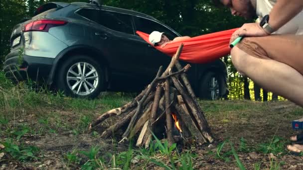 Couple Laying Hammock Cuddling Having Fun Fireplace Front Suv Car — Stock Video