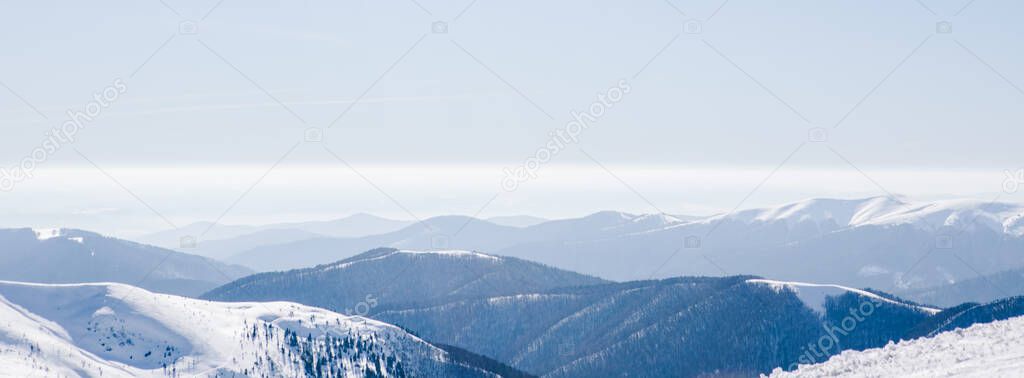 panoramic view of winter snowed mountains beauty in nature. copy space