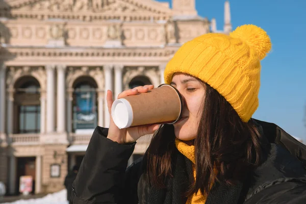 Young Woman Disposable Cup Drinking Coffee Lviv Opera Building Background — Stock Photo, Image