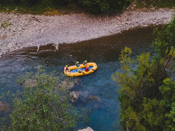 Aerial view of mountain river people rafting in creek — Stock Photo, Image