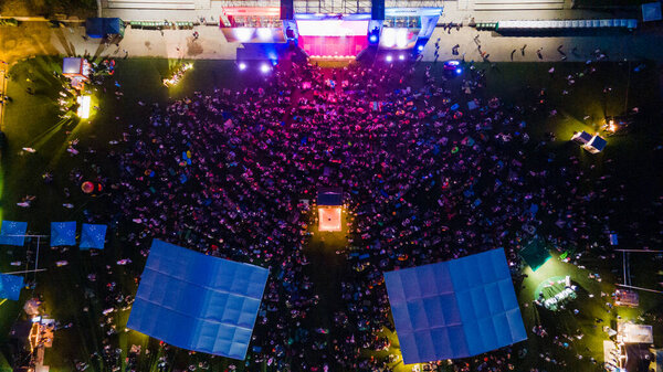 Lviv, Ukraine - June 26, 2021: overhead top view of lviv jazz fest summertime night time