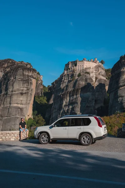 Ελλάδα Car Travel Concept Man Standing Suv Looking Meteora Monastery — Φωτογραφία Αρχείου
