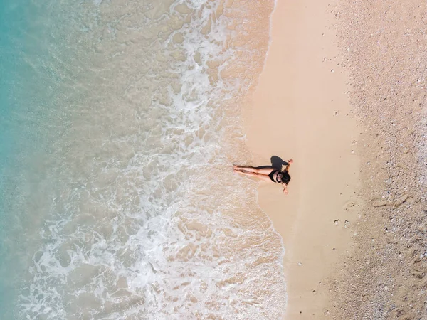 Overhead View Woman Black Swimsuit Sunbathing Sea Shore Sandy Beach — Stock Photo, Image