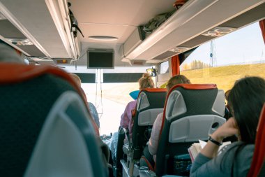 inside coach bus road trip highway