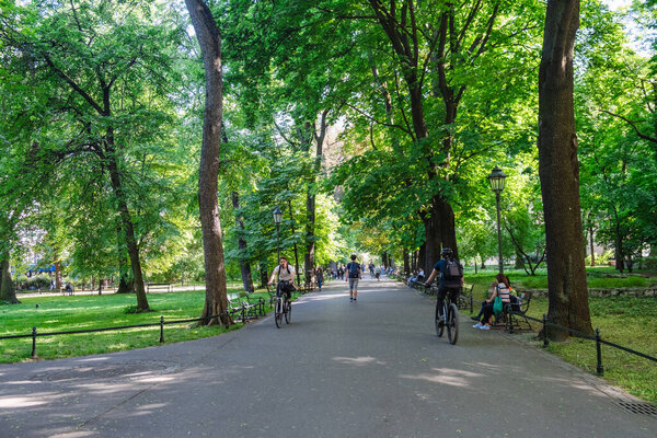 Krakow, Poland - May 19, 2022: view of city public park summer time