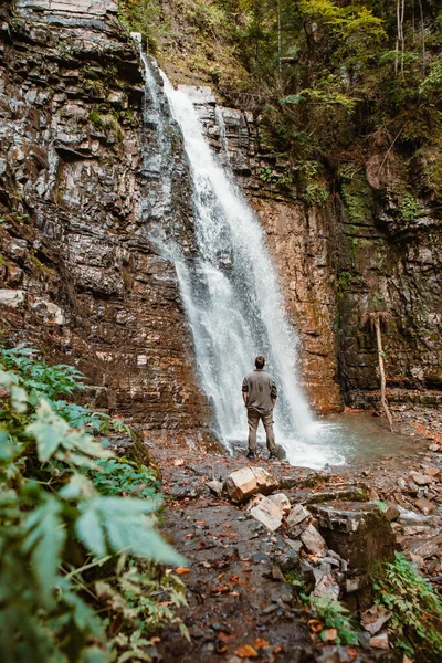 Young Strong Man Hiker Looking Waterfall Copy Space — Stock Photo, Image