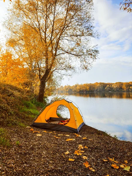 autumn camping site near lake copy space