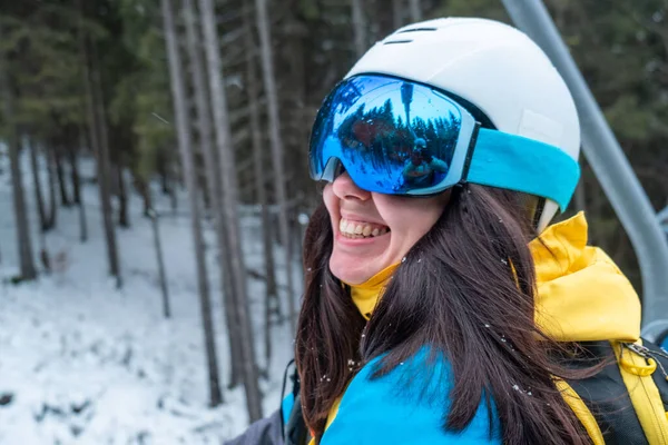 woman in ski helmet portrait close up