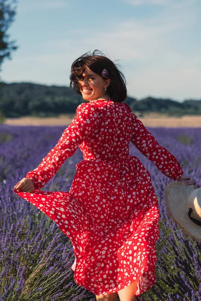 Young Woman Red Dress Running Lavender Field Holding Straw Hat — Stock Photo, Image