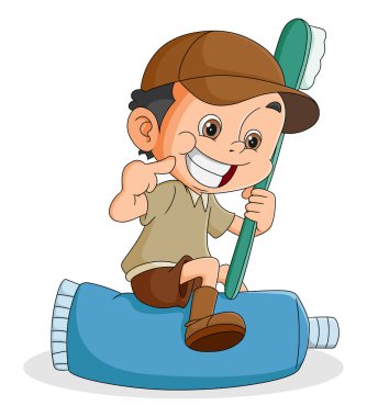 Mutlu çocuk elinde diş fırçası ve büyük bir diş macunu tutarken gülümsüyor.