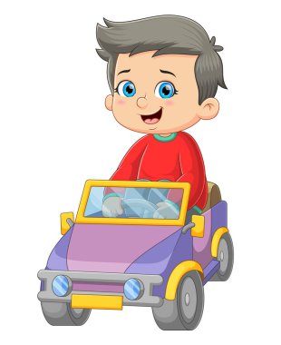 Çocuk, resmin mutlu bir ifadesiyle küçük havalı bir araba çalıyor.
