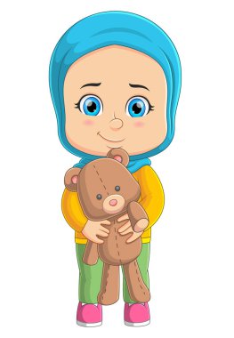 Genç kız resimli oyuncak ayıyla oynuyor.