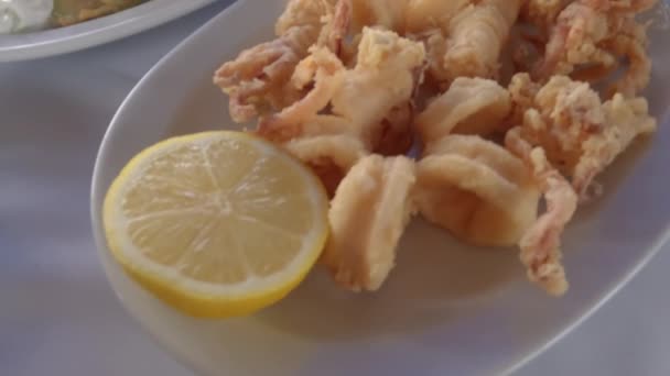 Greek Tavern Meze Starter Food Closeup Dishes Fresh Fried Potatoes — Stock Video