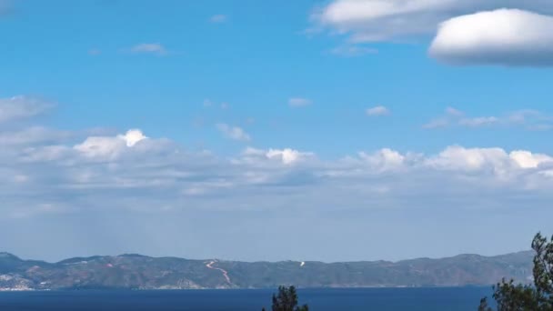 Day Time Lapse Blue Sky Fast Moving Clouds Mountainous Coastline — kuvapankkivideo