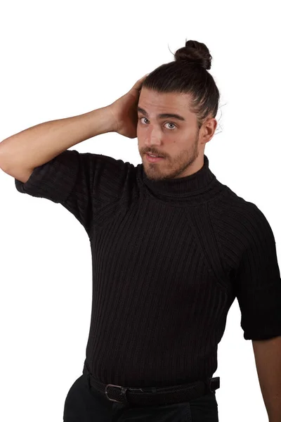 Man in black jersey with white background making funny gestures — Fotografia de Stock