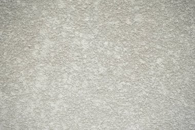 İç veya dış tasarım için doku. Gri renkli dekoratif alçı, küçük sivilceler, duvar yüzeyi. 