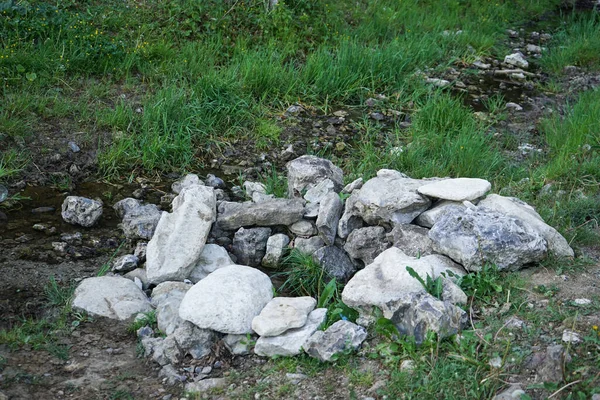 Nature of Ukraine. A spring surrounded by stones.