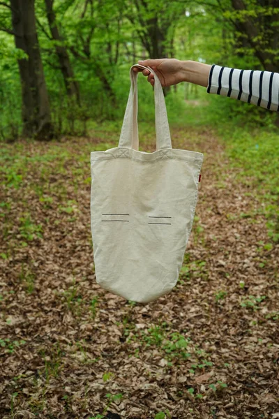 Shopper bag. The concept of recycling in the field of environmental protection. Eco bag made of double thread.