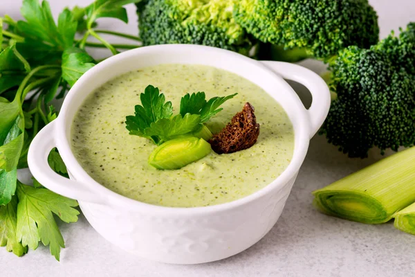 Fresh Broccoli Soup with Leek Healthy Diet Vegetarian Soup Light Gray Background Horizontal