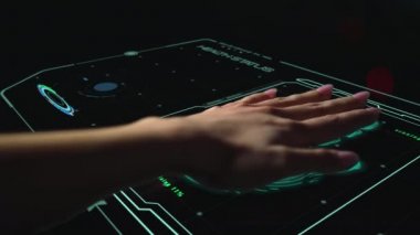 Futuristic medical biometrical scanner analysing hand check health level closeup