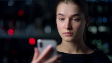 Woman phone diagram holograms display process collecting financial data closeup