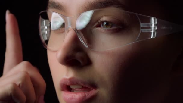 Futuristic glasses diagram hologram vision woman analysing connection in system — Videoclip de stoc