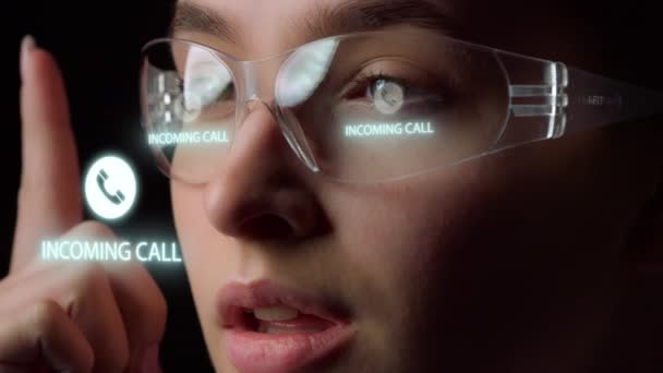 Futuristic glasses recognition system identifying accepting income call closeup — Stockvideo