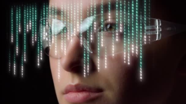 Digital matrix glasses hologram display column numbers futuristic device closeup — Stock video