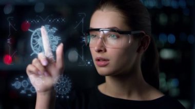 Woman scientist designing turbine at factory research engine hologram close up